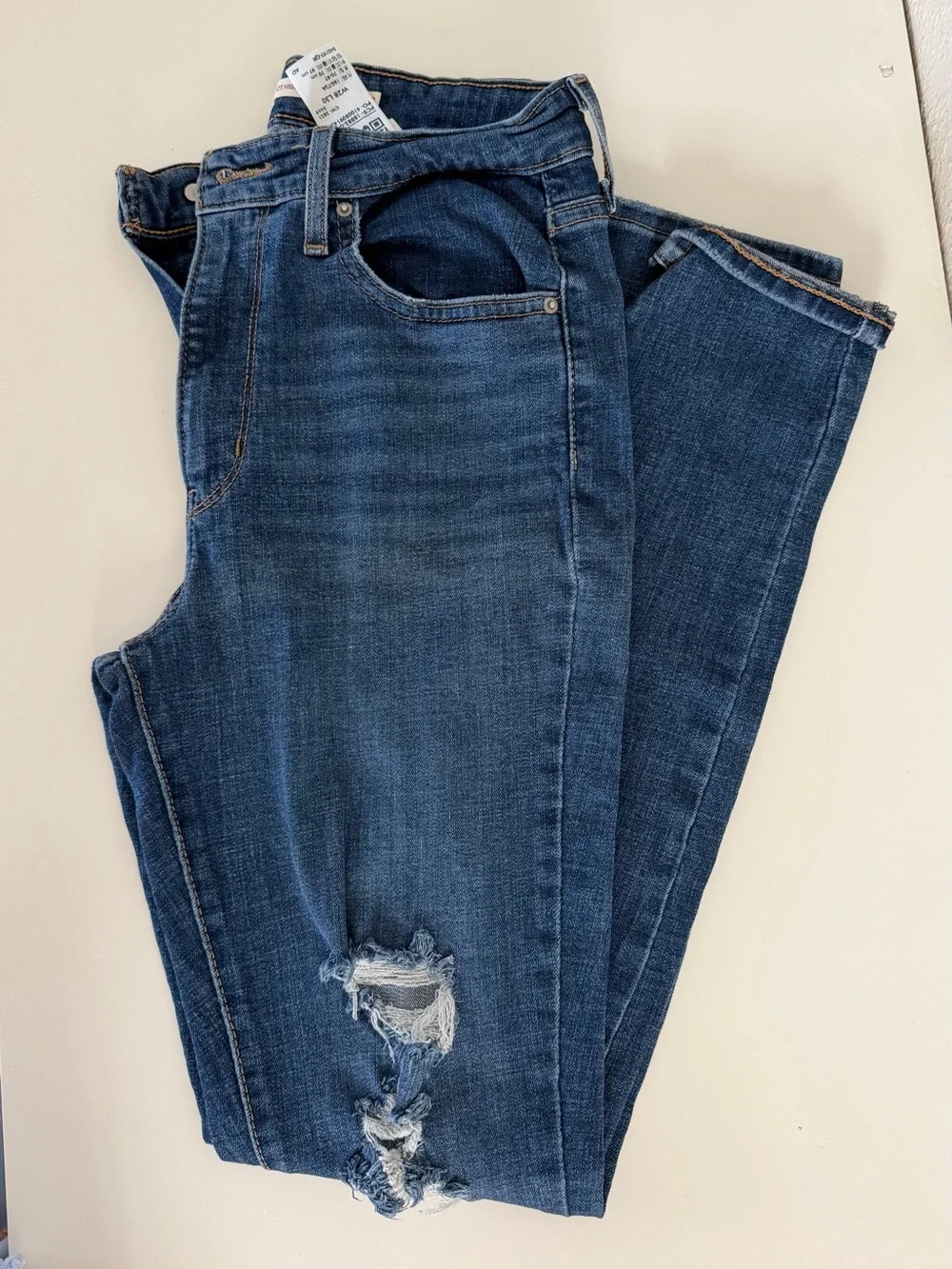 Levi's Dark Blue Skinny Jeans with Knee Rips